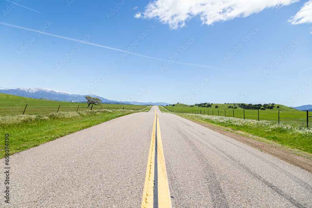 Long open road in the California countryside