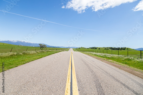Long open road in the California countryside
