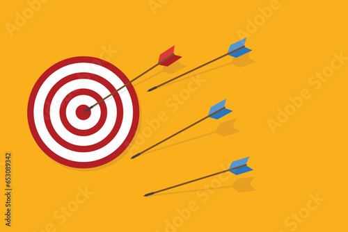 Blue arrows missed hitting target and only red one hits the center. Business challenge failure and success concept. 