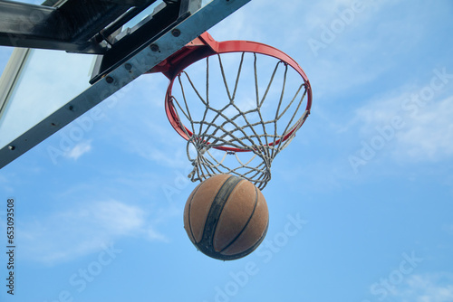 Ball in basketball hoop. Sport. Hobby. Lifestyle © andranik123