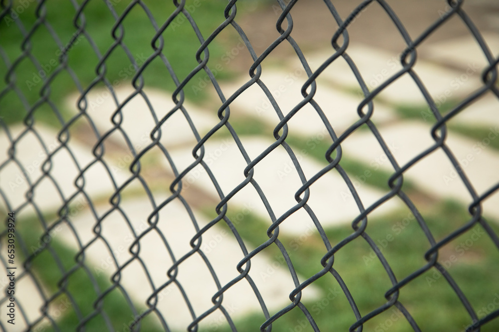 Chain link fence in outdoor background. Chain link fence in outdoor background.