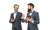 mature men. Agile business. partnership of men speaking on phone. collaboration and teamwork. business communication on meeting. team success. bearded businessmen in formal suit. Staying in touch