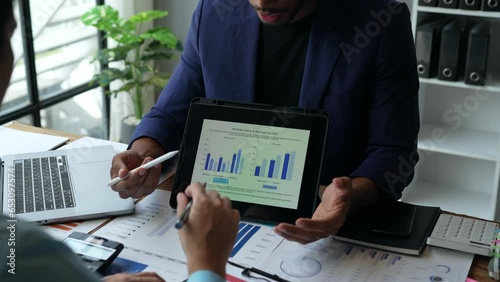 Analyzing results Businessman accountant or financial expert analyze business report graph and finance chart at the corporate office. Concept of finance economy, banking business, and stock market.