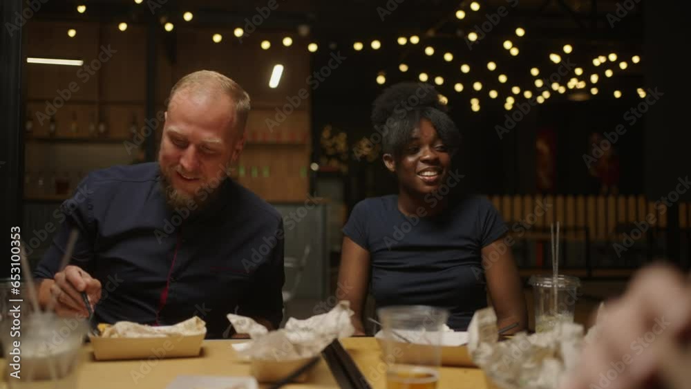 Mixed Race Couple In Family Dinner In Restaurant, Young Black Woman And Caucasian Man, Portrait