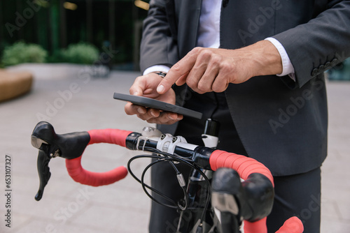 Man using mobile app and unlocking the parking lot