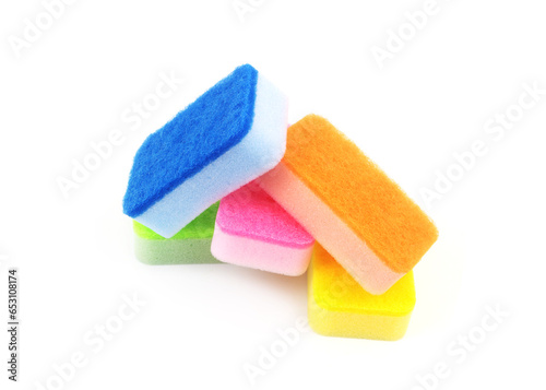 Heap of sponges isolated on white background. Washing and cleaning concept.