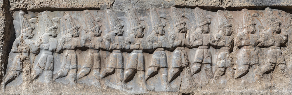 Rock relief, depicting the twelve Hittite gods of the Underworld in Yazilikaya, a sanctuary of Hattusa. Near Bogazkale, Corum, Turkey