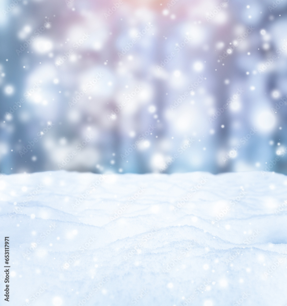 Winter background with snow and falling snowflakes. Blurred Christmas background