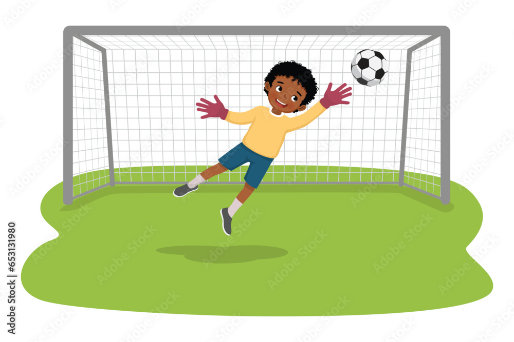 Fototapeta premium Little African boy goalkeeper diving to save a soccer ball