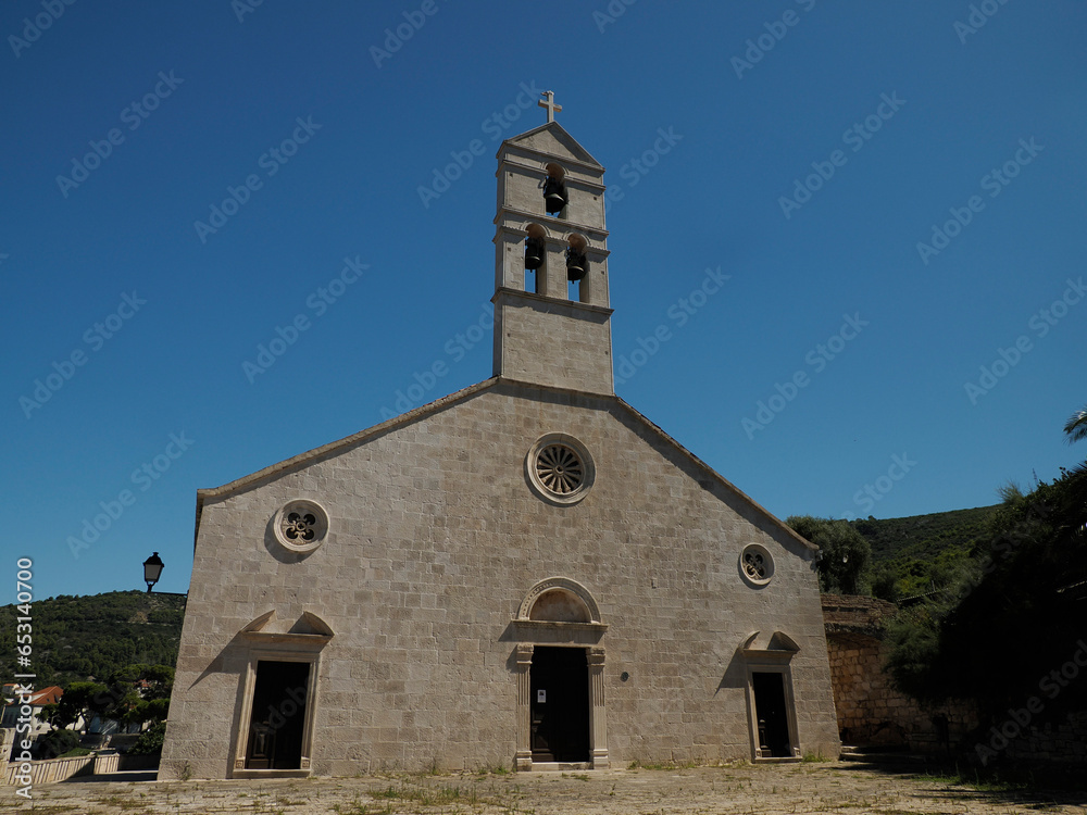 church vis island croatia village houses during a bright summer day
