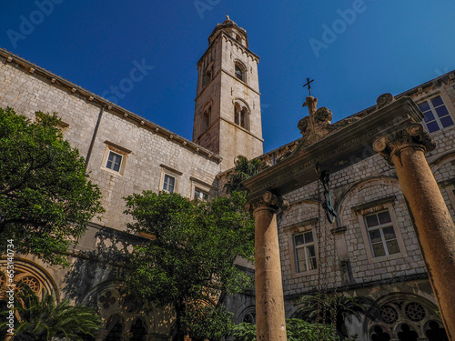 Courtyard and cloisters of Franciscan Monastery in the old town of Dubrovnik in Croatia photo