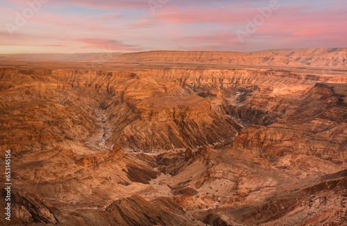Panoramic view of Fish River Canyon in Southern Namibia, with impressive size and stunning geological formations. Captured at sunrise. © Maurizio De Mattei