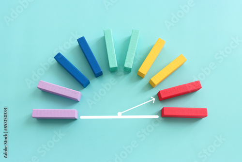 Concept image of barometer made from colorful cubes. Idea of risk level and assessment photo