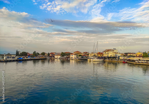 View from the water of the shore of Keramoti village , north-eastern part of Greece , Europe. photo