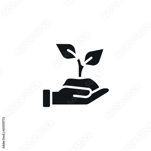 Ecology simple glyph icon. Human hand with a plant. Vector solid isolated black illustration.