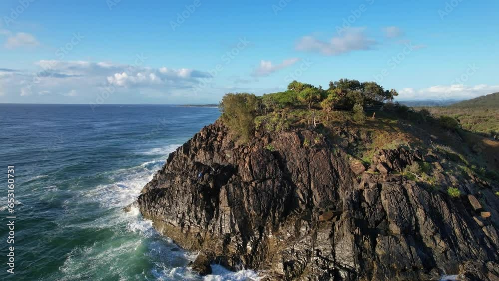 Ocean Waves Splashing At Norries Head, New South Wales, Australia - aerial shot Ocean Waves Splashing At Norries Head, New South Wales, Australia - aerial shot