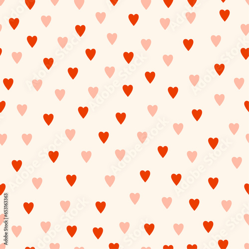 Cute hearts seamless pattern. Random romantic pattern in retro style. Simple vector red and pink hearts. Creative design for fabric, notebook, gift wrapping.