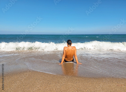 girl swimming among the waves in Cabo de Gata Almería