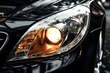 Close up reveals the opulent elegance of a high end cars headlight