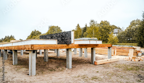 Building construction of wooden frame house made of SIP structural insulated panels. OSB oriented strand board, EPS expanded polystyrene. Energy-efficient eco-friendly green Canadian technology