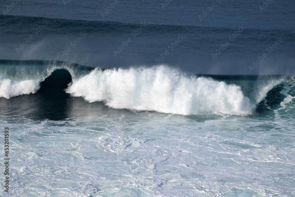 beach waves on a sunny morning, beach waves break the calm on the beach beach waves on a sunny morning, beach waves break the calm on the beach