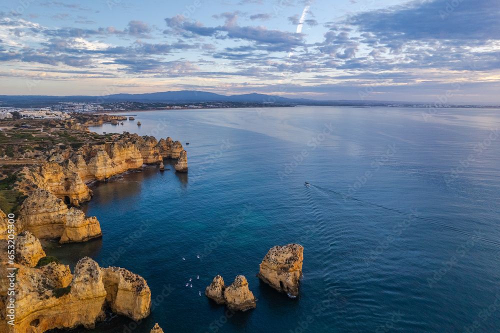 Ponta da Piedade, Algarve, Portugal. Natural beach and cliffs. Aerial drone view
