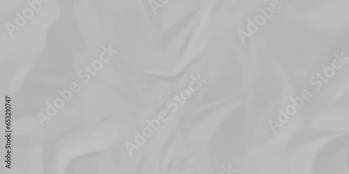 White satin crumpled paper texture and White crumpled paper texture crush paper so that it becomes creased and wrinkled. Old white crumpled paper sheet background texture.