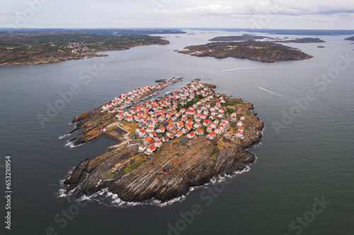 Aerial view of the island and the fishing village of Astol, Tjorn municipality, Vastra Gotaland, Gotaland, Sweden, Scandinavia photo