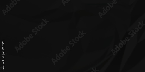 Dark crumple black fabric paper wrinkled poster template ,blank glued creased paper texture background. black paper crumpled backdrop background. used for cardboard and clarkboard.