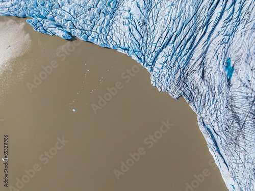 Aerial vertical view by drone of Fjallsjokull Glacier Lagoon during a summer day, Iceland, Polar Regions photo