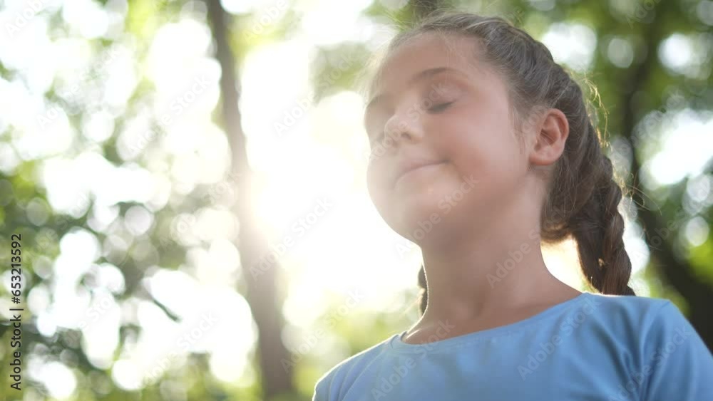child closed eyes. little girl closed her a eyes dreaming about the future in the forest in nature in the park. happy family lifestyle kid dream concept. happy family kid dream concept child closed eyes. little girl closed her a eyes dreaming about the future in the forest in nature in the park. happy family lifestyle kid dream concept. happy family kid dream concept