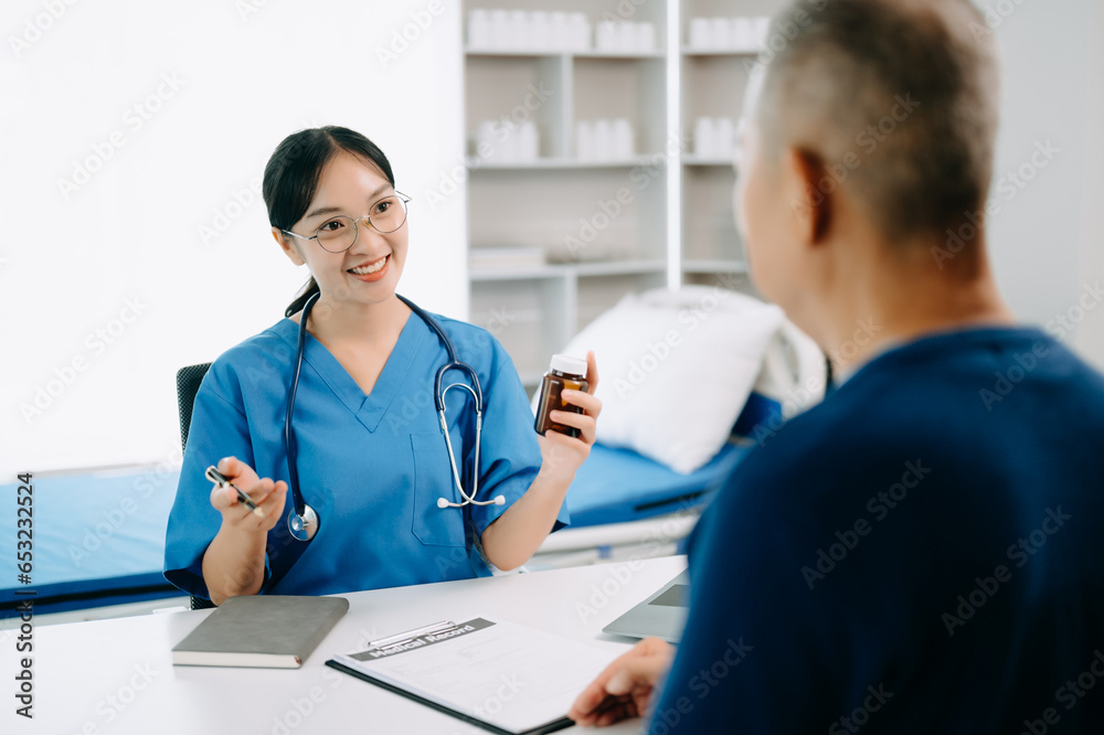 Serious Asia female doctor using clipboard is delivering great news talk discuss results or symptoms with female patient in clinic or hospital . Serious Asia female doctor using clipboard is delivering great news talk discuss results or symptoms with female patient in clinic or hospital .