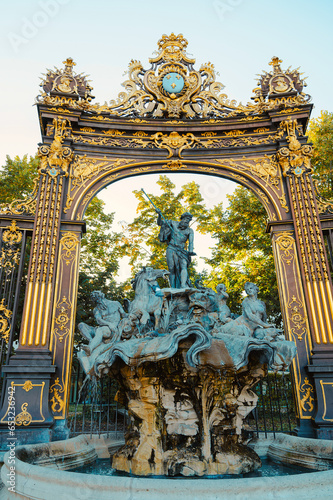 Neptune Fountain at the Place Stanislas in Nancy, France, departement Lorraine, golden gate photo
