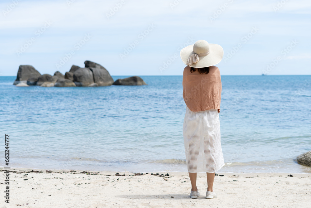 Sad and disappointed woman standing by the sea, alone, young female travel for recreation and relax lonely on summer, travel, vacation, worried, problem, nature, landscape, leave of work, vacation day