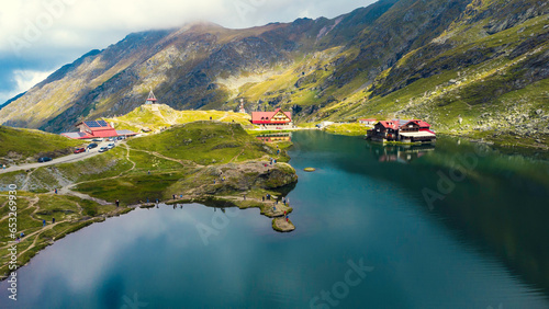 Aerial top down view Balea mountain lake. Romania Transfagarash. Shot on drone. Famous tourism travel destination