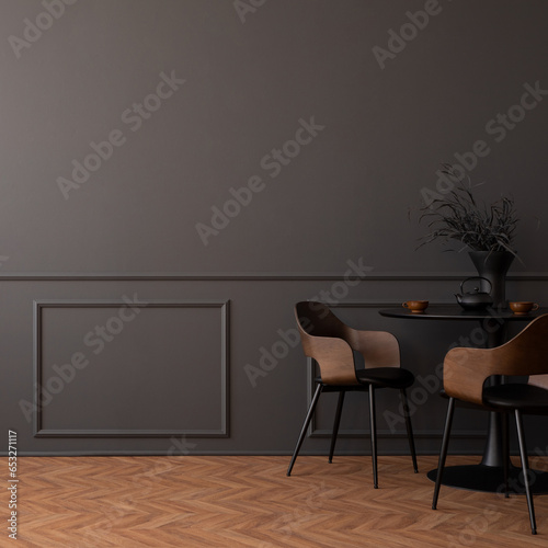 Minimalist composition of living room interior with copy space, dark wall with stucco, stylish chair, round table, plants, wooden panels floor and personal accessories. Home decor. Template.