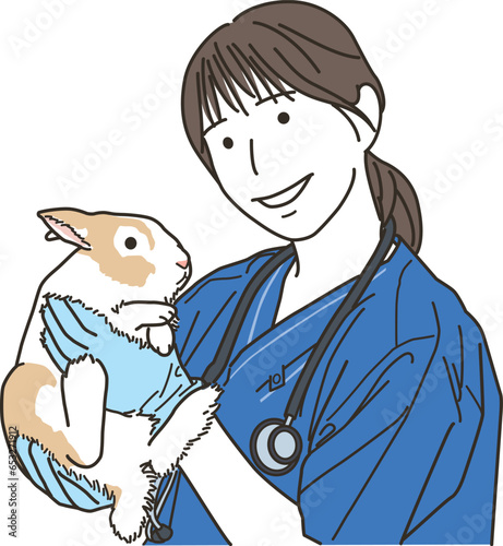 兎（小動物）を抱っこする女性の獣医
