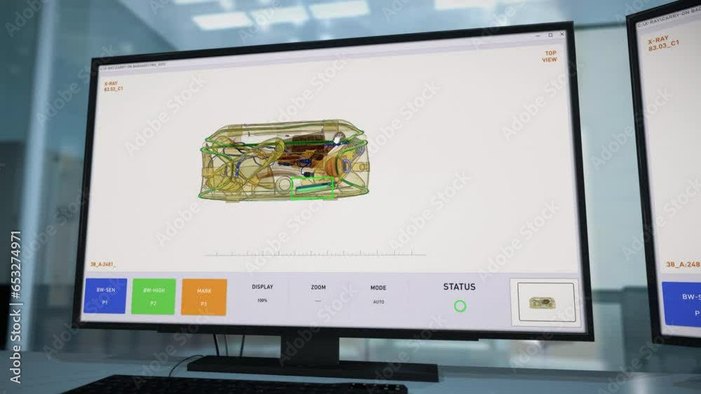 Xray scanner is shown on the computer monitor at the airport. An Xray