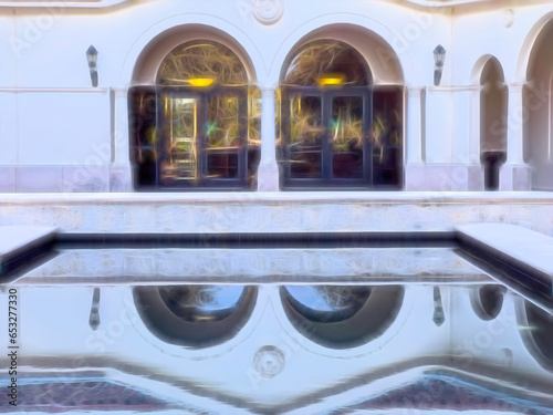Courtyard view of two arched doorways and reflections in shallow pool on campus of a state university in Florida. Digital glow effect, 3D rendering. For architectural, educational, and urban motifs.