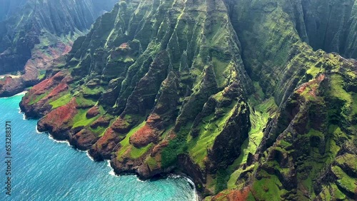 Aerial towering Pali sea cliffs Kalalau Trail Kauai 