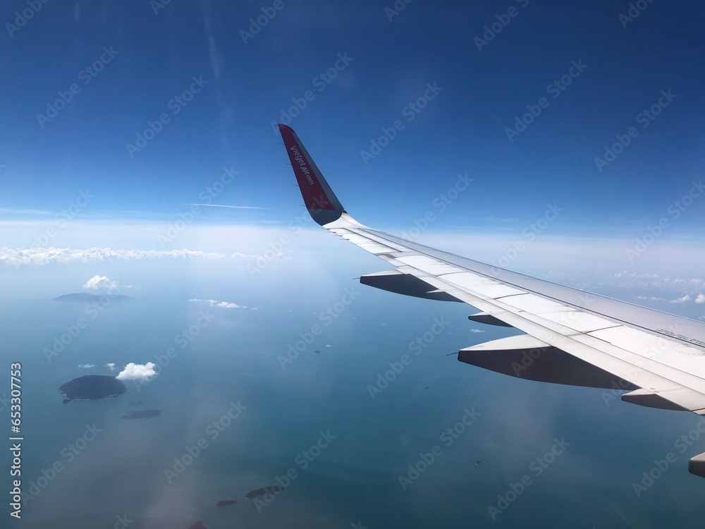 Obraz premium view from an airplane window. Clouds. Wing