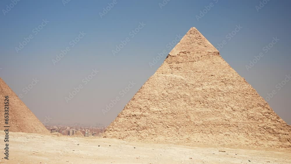 Panoramic shot of The Great Pyramid and Pyramid of Khafre in Giza. Cairo, Egypt. Ancient mystical Wonders of the World Panoramic shot of The Great Pyramid and Pyramid of Khafre in Giza. Cairo, Egypt. Ancient mystical Wonders of the World