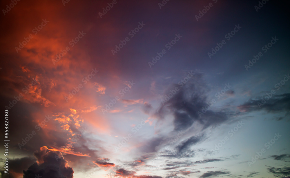 Colorful sky with rain clouds at sunset time