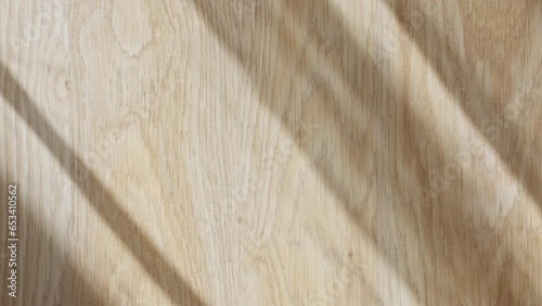 wood texture with shadow from curtain top view, rippling transparent fabric with shadow on the floor