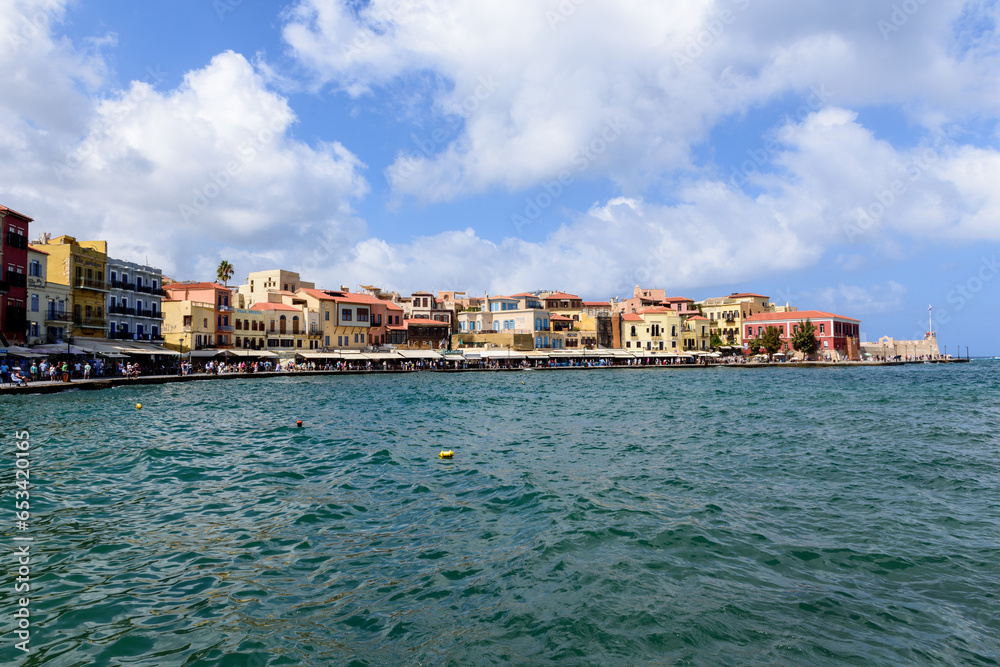 Old town main quay with colorful buildings, bars and restaurants. One of the most famous place in Chania town.