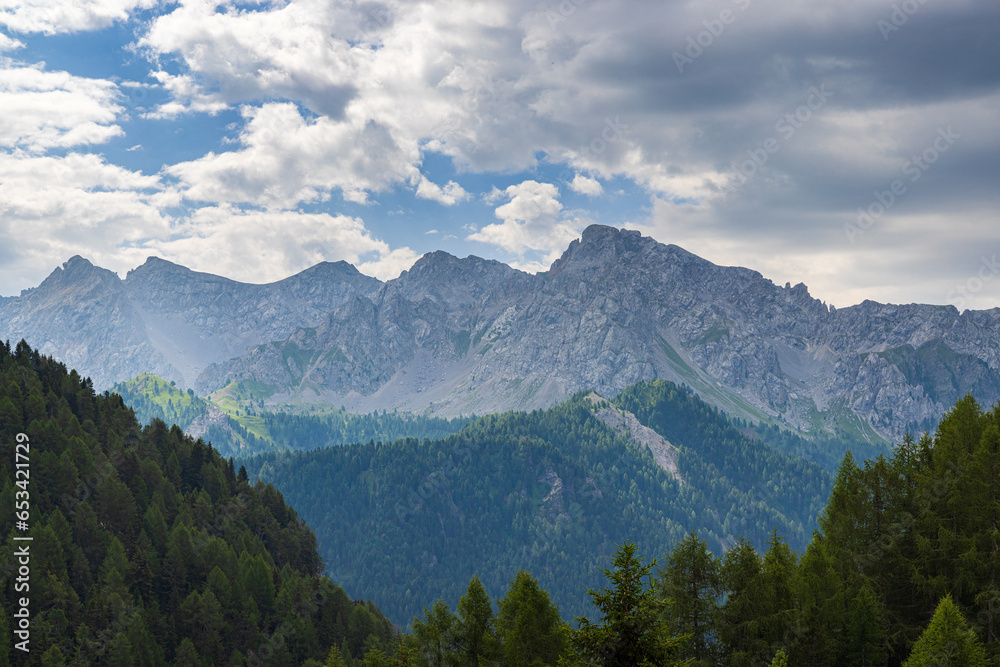 A view of the Dolomites and the countryside into Val di Fassa A view of the Dolomites and the countryside into Val di Fassa