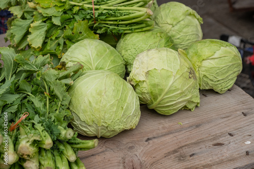 organically grown cabbages and turnip greens in a traditional market in Galicia, Spain