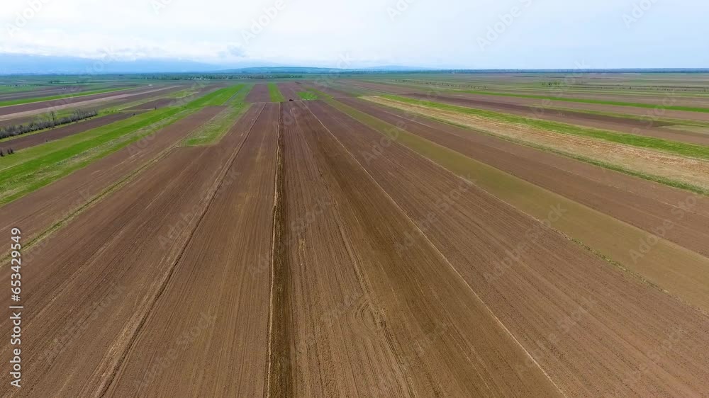 Spring sowing work. Equipment sows wheat Spring sowing work. Equipment sows wheat
