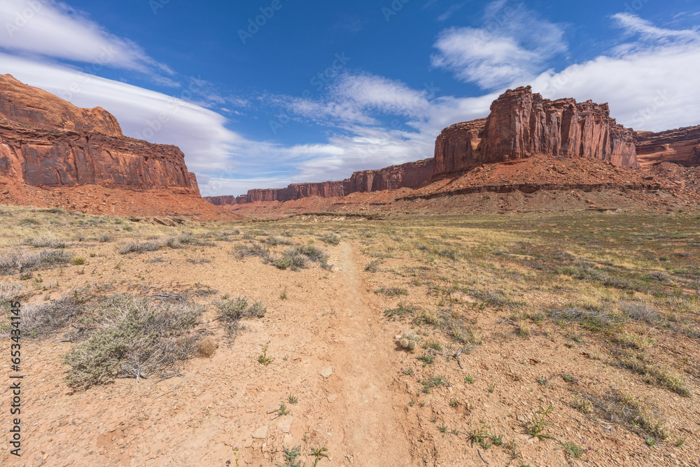 hiking the alcove spring trail, canyonlands national park, usa hiking the alcove spring trail, canyonlands national park, usa