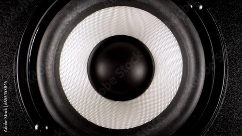 Audio Speaker Close up. Speakers making loud sound music. Close up of loud bass speaker vibration. photo